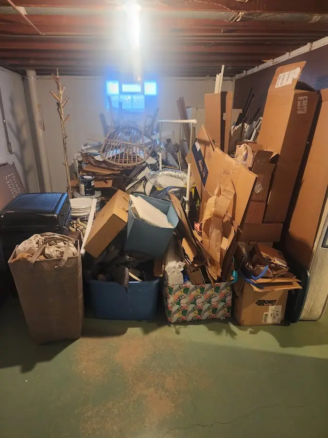 Roll-off dumpster container at job site for 6 Yard Dumpster Rental in Dandridge